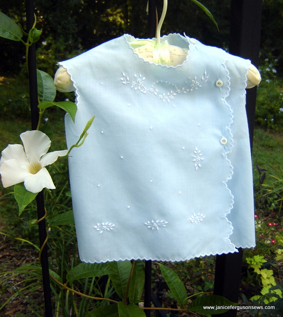 SOLD and shipped #6 Easy Care Diaper Shirt with diaper cover. $14 + shipping. Another Old San Juan purchase, frequently worn but still in perfect, like new condition. Utility buttons replaced with mother of pearl. Hand stitched surface embroidery with scallops and construction done by machine. Suitable for boy or girl.Details and history in blog post Puerto Rican Diaper Shirt.