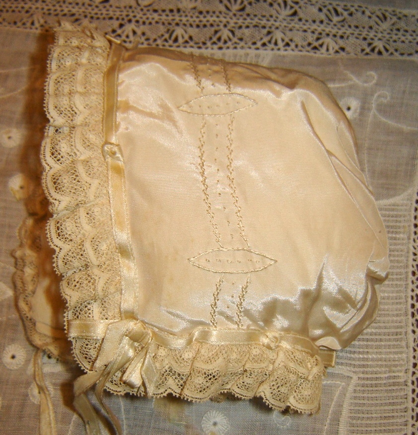 #A2 Silk Bonnet, $30. Near perfect condition except for ribbon ties. Fully lined with a crepe like fabric.