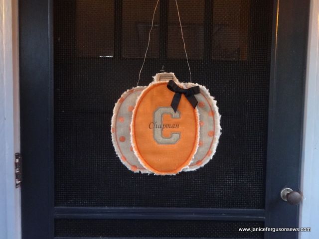 Fun project! Pumpkin Door Hanger from Hang To Dry. The applique' font and the text were from Brother's PE-NEXT editing program.